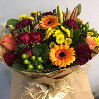 Delight - A mixed bouquet of burnt orange and reds Delight - A mixed bouquet of burnt orange and reds
