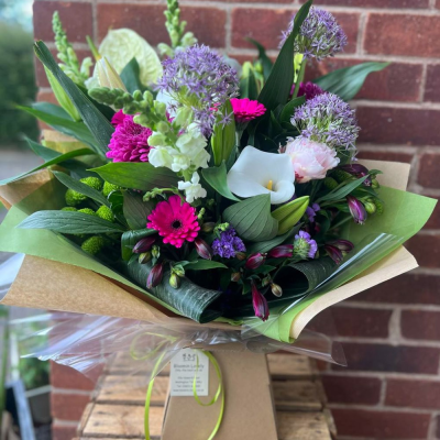 Violet Pop - A striking modern bouquet with pops of purple allium, white calla, hot pink gerbera, snapdragon, and lush green tones. Packed with texture and attitude. Violet Pop - A striking modern bouquet with pops of purple allium, white calla, hot pink gerbera, snapdragon, and lush green tones. Packed with texture and attitude.