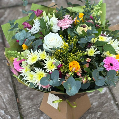 Happy Heart - A joyful burst of seasonal blooms in pinks, whites, and yellows with gerbera, roses, snapdragons, and lush eucalyptus. A perfect all-occasion pick-me-up. Happy Heart - A joyful burst of seasonal blooms in pinks, whites, and yellows with gerbera, roses, snapdragons, and lush eucalyptus. A perfect all-occasion pick-me-up.