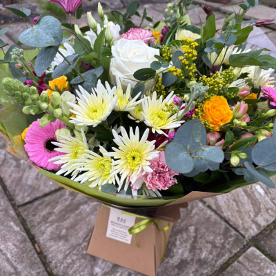 Lemon Fizz - Zesty and bright, this mixed bouquet blends lemon-toned chrysanthemums, gerberas, roses and snapdragons with soft pinks and purples for a citrusy spring feel. Lemon Fizz - Zesty and bright, this mixed bouquet blends lemon-toned chrysanthemums, gerberas, roses and snapdragons with soft pinks and purples for a citrusy spring feel.