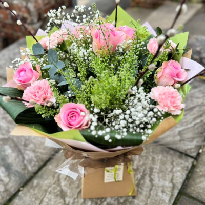 Sweet Blush - A soft and graceful arrangement of pink roses, carnations, gypsophila, and willow accents. Delicately elegant for birthdays, thank-yous, or sympathy. Sweet Blush - A soft and graceful arrangement of pink roses, carnations, gypsophila, and willow accents. Delicately elegant for birthdays, thank-yous, or sympathy.
