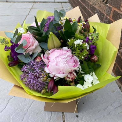 Secret Garden - A lovely handtied with seasonal flowers a mix of purple and pink, with complimentary foliage. Hand delivered Wellington and surrounding areas by Bloomin Lovely. Secret Garden - A lovely handtied with seasonal flowers a mix of purple and pink, with complimentary foliage. Hand delivered Wellington and surrounding areas by Bloomin Lovely.