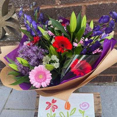 Perfect Blooms - A bright handtied with seasonal flowers a mix of purple,red and pink, with complimentary foliage. Hand delivered Wellington and surrounding areas by Bloomin Lovely. Perfect Blooms - A bright handtied with seasonal flowers a mix of purple,red and pink, with complimentary foliage. Hand delivered Wellington and surrounding areas by Bloomin Lovely.