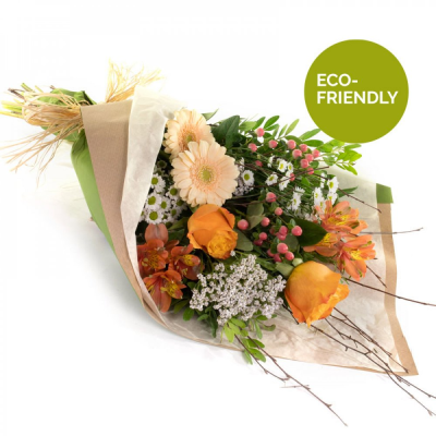 Peaches and Cream - Flowers in shades of Orange/peach  and white simply wrapped in paper or your choice with no cellophane.  Peaches and Cream - Flowers in shades of Orange/peach  and white simply wrapped in paper or your choice with no cellophane.