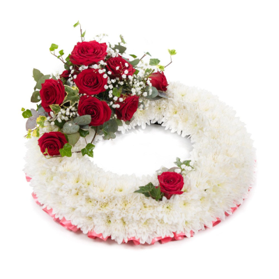 Wreath SYM-314 - This white massed wreath is finished with a red rose spray for an extra special tribute.
 Wreath SYM-314 - This white massed wreath is finished with a red rose spray for an extra special tribute.