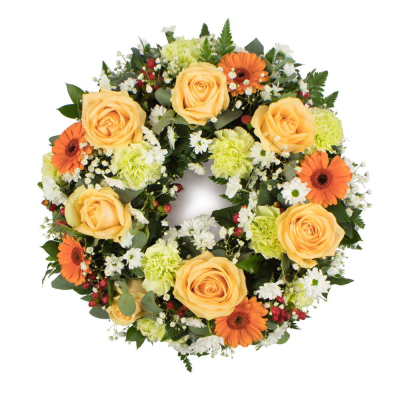 Wreath SYM-315 - A beautiful classic wreath arranged using peach and green flowers and finished with fine foliage.
 Wreath SYM-315 - A beautiful classic wreath arranged using peach and green flowers and finished with fine foliage.