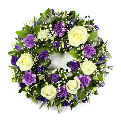 Wreath SYM-316 - A beautiful classic wreath arranged using purple and white flowers and finished with fine foliage.
 Wreath SYM-316 - A beautiful classic wreath arranged using purple and white flowers and finished with fine foliage.