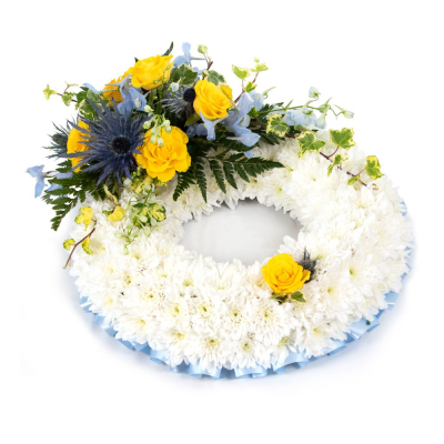 Wreath SYM-319 - This white massed wreath is finished with a blue and yellow spray for an extra special tribute.
 Wreath SYM-319 - This white massed wreath is finished with a blue and yellow spray for an extra special tribute.